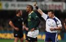 JP Pietersen of South Africa is sent to the sin bin by referee Nigel Owens after a high tackle on Jimmy Cowan in Durban