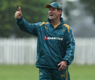 Australia coach Robbie Deans shows his approval during training at Westerford High School, Cape Town, South Africa, August 6, 2009