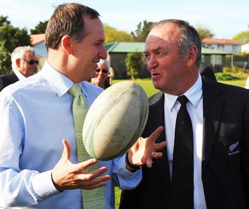 All Blacks coach Graham Henry talks with New Zealand Prime Minister John Key