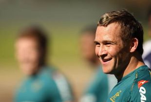Matt Giteau shares a joke with his team-mates  during a Wallabies training session at Leichhardt Oval, Sydney August 17, 2009
