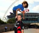 Saracens captain Steve Borthwick gets to grips with a member of dance act Diversity