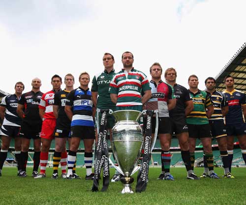 The 12 captains of the Guinness Premiership teams pose with the trophy