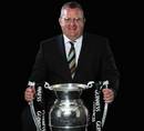 Acting Harlequins head coach John Kingston poses with the Guinness Premiership trophy