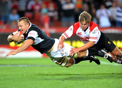 Natal Sharks' Jean Deysel scores against Lions during their latest Currie Cup clash