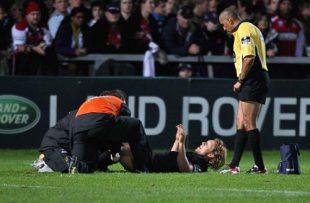 Jonny Wilkinson of Newcastle receives attention after being injured during the Guinness Premiership match between Gloucester and Newcastle Falcons at Kingsholm on September 30, 2008 in Gloucester, England.