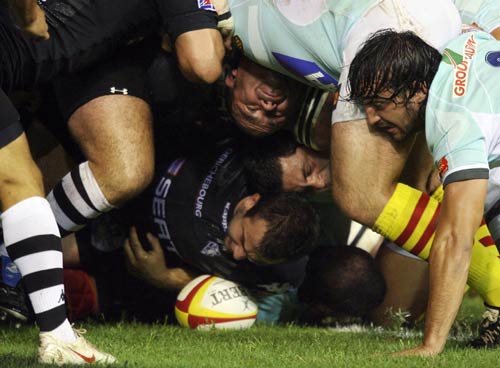 Brive hooker Guillaume Ribes does his utmost to nudge the ball out of the scrum in Perpignan
