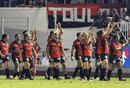 Toulon's players enjoy a lap of honour after their win
