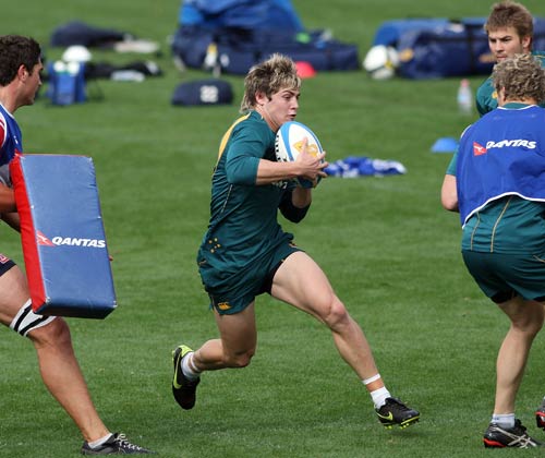 James O'Connor looks to take on the defence during a Wallabies training session in Brisbane