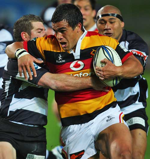 Waikato's Hikairo Forbes is wrapped up by the Hawke's Bay defence