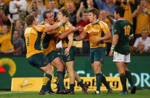 Wallaby fullback James O'Connor is mobbed by his team-mates victory after crossing for the game-deciding try, Australia v South Africa, Tri-Nations, Suncorp Stadium, Brisbane, Australia, September 5, 2009