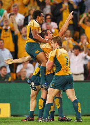 Australia's James O'Connor is engulfed by his team-mates, Australia v South Africa, Tri-Nations, Suncorp Stadium, Brisbane, Australia, September 5, 2009