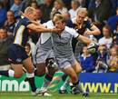 Newcastle's Rob Vickerman is snared by the Leeds defence