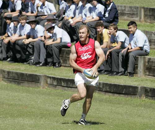 South Africa flanker Schalk Burger runs with the ball during training 