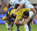 Clermont Auvergne's Gonzalo Canale is tackled by the Racing Metro defence