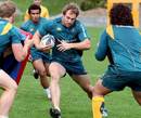 Australia flanker Rocky Elsom charges forward during training