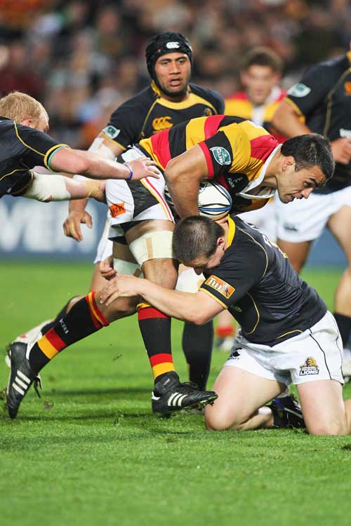 Waikato's Liam Messam takes on the Wellington defence