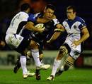 Sale's Chris Bell is tackled by Bath wing Joe Maddock