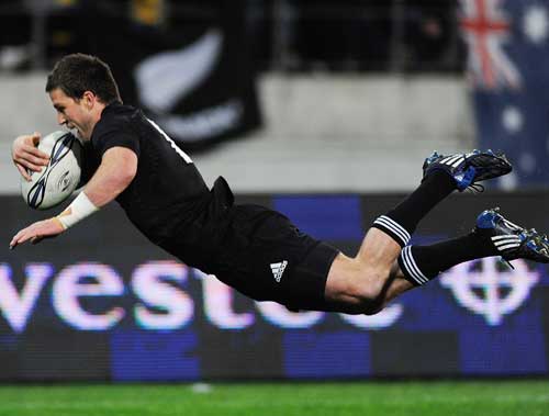 All Blacks wing Cory Jane goes airborne to score
