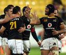 Wellington players celebrate a try