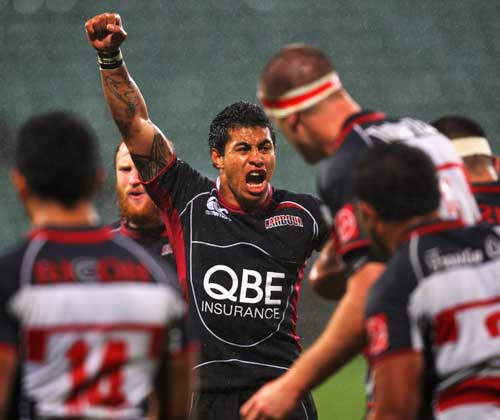 North Harbour's George Pisi celebrates a try for his side