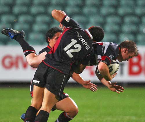 North Harbour's Andrew Mailei tackles Counties Manukau's Dean Cummins
