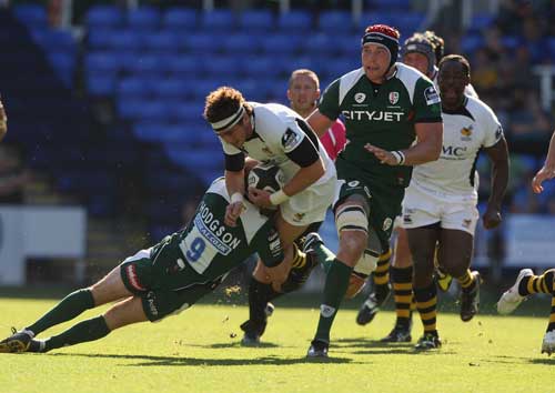 Wasps fly-half Danny Cipriani is halted by the London Irish defence
