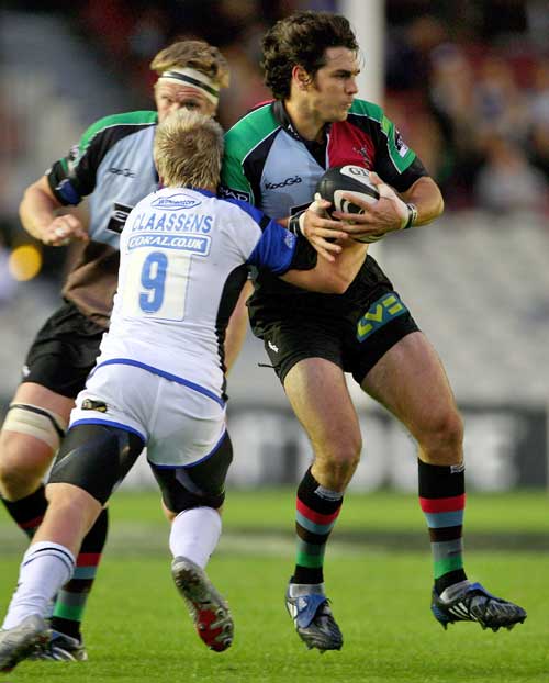 Quins Gonzalo Tiesi is tackled by Bath's Michael Claassens