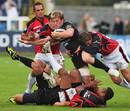 Newcastle's Rob Vickerman is surrounded by the Saracens defence