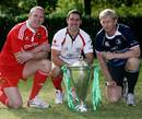 Munster's Paul O'Connell, Ulster's Paddy Wallace and Leinster's Leo Cullen pose with the Heineken Cup