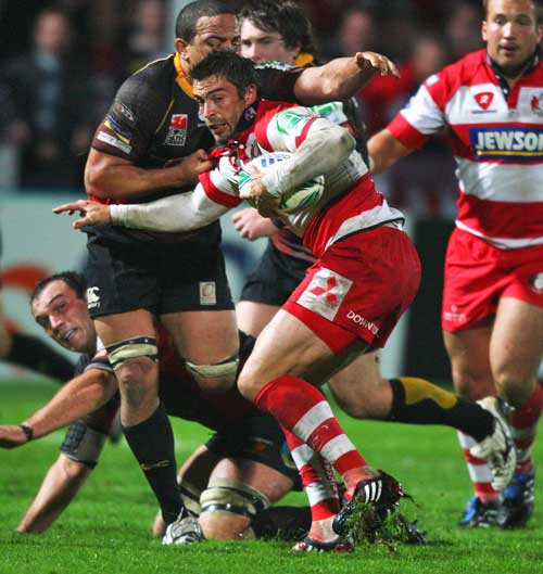 Gloucester's Nicky Robinson takes on the Dragons defence