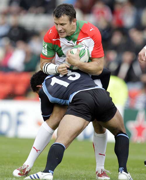 Glasgow Warriors' Dave McCall tackles Biarritz's Damien Traille