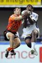 Clermont winger Napolioni Nalaga fights for the ball with Viadana's Michele Sepe