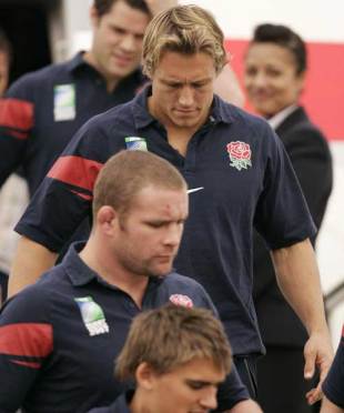 England fly-half Jonny Wilkinson follows his team-mates from the plane following their loss in the Rugby World Cup final, Heathrow Airport, London, October 22, 2007
