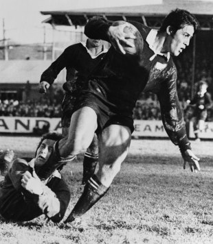 All Blacks centre Bryan George Williams manages to break the tackle of Lions captain John Dawes in Dunedin, New Zealand v British & Irish Lions, Dunedin, New Zealand, June 30, 1971