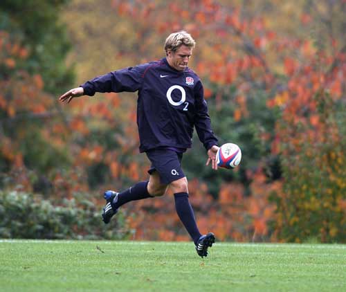 England fly-half Jonny Wilkinson kicks during training