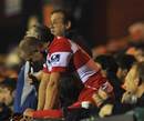 Gloucester centre Mike Tindall shows his disappointment after leaving the field with an injury