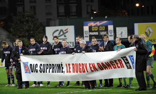 Stade Francais players protest a proposed change to French tax law