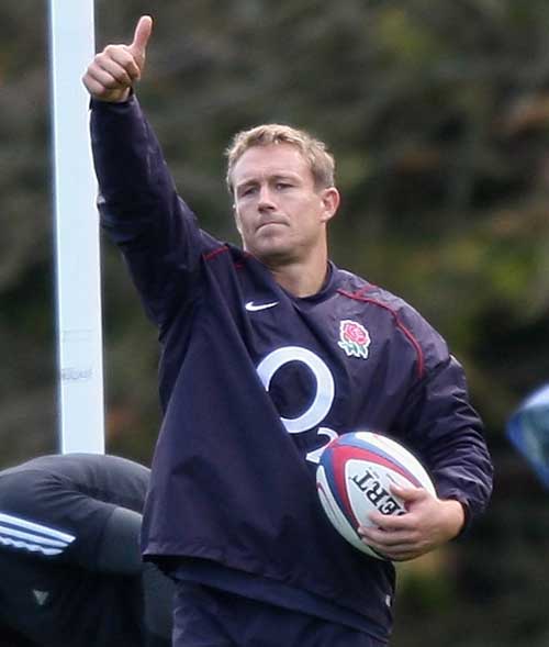 England fly-half Jonny Wilkinson signals to a team-mate in training