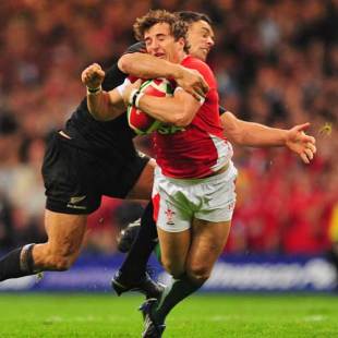 Wales' Martin Roberts is tackled by New Zealand's Dan Carter, Wales v New Zealand, Millennium Stadium, Cardiff, Wales, November 7, 2009