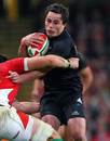 New Zealand's Zac Guildford stretches the Wales defence