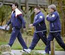 Marc Lievremont, Didier Retiere and Jo Maso arrive for a training session
