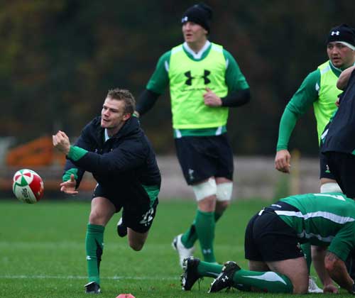 Wales scrum-half Dwayne Peel fires a pass during training