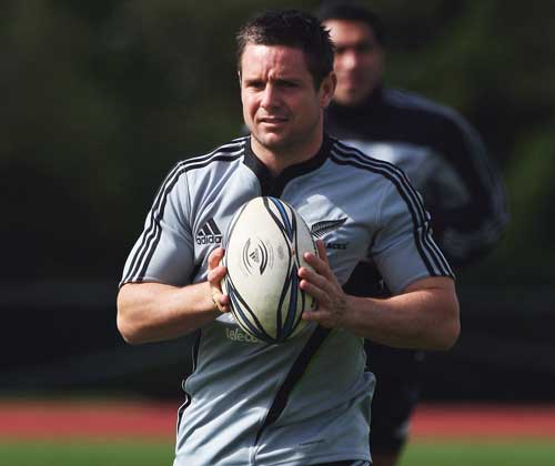 New Zealand fly-half Mike Delany waits for instructions during training