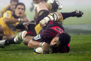 Crusaders centre Casey Laulala slides in to score the match winning try in the Super 14 final, Crusaders v Hurricanes, Super 14 final, Lancaster Park, May 27 2006.