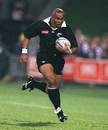 Jonah Lomu in action for New Zealand in 1999