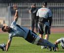 New Zealand No.8 Liam Messam stretches during training