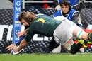Vincent Clerc evades Schalk Burger to score for France against South Africa in Toulouse