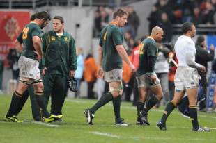 South African players leave the pitch at the end of their Rugby union test match France vs. South Africa at the Stade Toulouse on November 13, 2009
