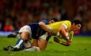 James Hook of Wales is tackled by David Lemi of Samoa at the Millenium Stadium