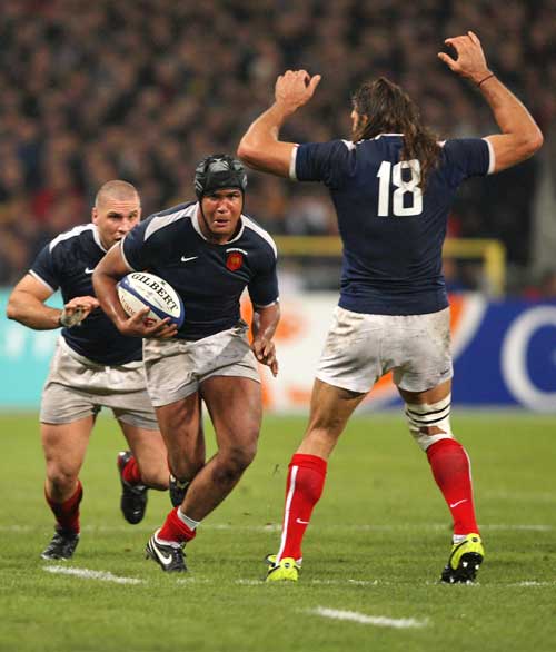 France's Thierry Dusautoir takes the attack to South Africa